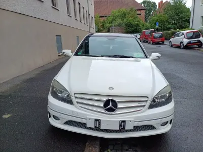 Używany Mercedes C180 143 KM (105 kW) 2010 Biały Coupe