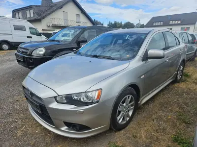 Gebraucht Mitsubishi Lancer 150 PS (110 kW) 2013 Merkursilber (m) Limousine
