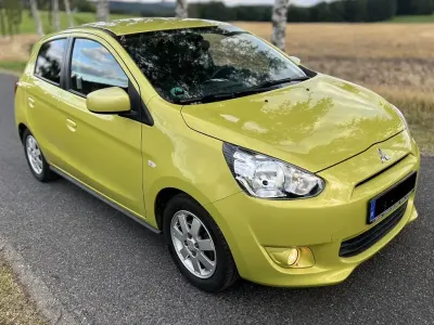 Gebraucht Mitsubishi Space Star 80 PS (58 kW) 2014 Gelb Van / Kleinbus