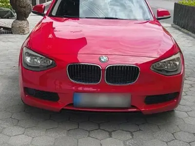 Gebraucht BMW 114 102 PS (75 kW) 2013 Rot Kleinwagen