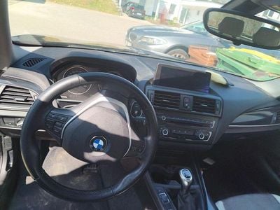 Second-hand BMW 118 Urban Line 143 CP (105 kW) 2012 Negru Hatchback