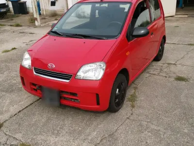Gebraucht Daihatsu Cuore 58 PS (42 kW) 2004 Rot Kleinwagen