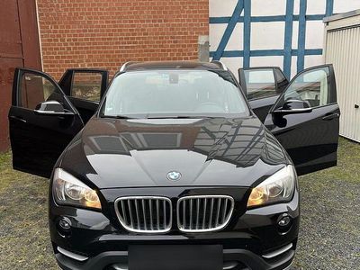 Second-hand BMW X1 184 CP (135 kW) 2014 Negru SUV