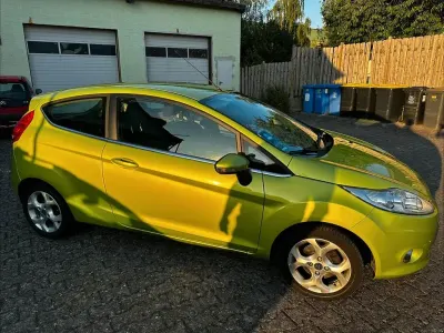 Gebraucht Ford Fiesta Titanium 95 PS (69 kW) 2011 Grün Limousine