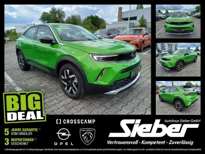 Gebraucht Opel Mokka Elegance 101 PS (74 kW) 2023 Matcha green/ikone gruen SUV