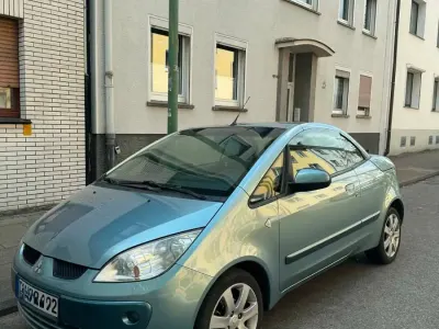 Używany Mitsubishi Colt 109 KM (80 kW) 2007 Niebieski Coupe