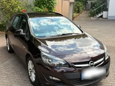 Gebraucht Opel Astra Energy 140 PS (102 kW) 2014 Braun Kombi