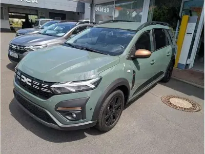 Gebraucht Dacia Jogger Extreme 94 PS (69 kW) 2025 Grau (staubgrau) Van / Kleinbus