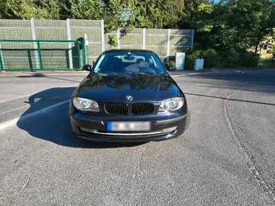 Gebraucht BMW 116 116 PS (85 kW) 2009 Schwarz Kleinwagen