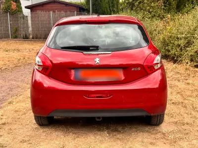 Gebraucht Peugeot 208 82 PS (60 kW) 2014 Rot Kleinwagen