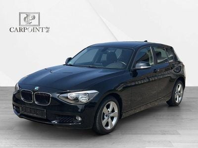 Begagnad BMW 116 136 HK (100 kW) 2012 Svart Halvkombi