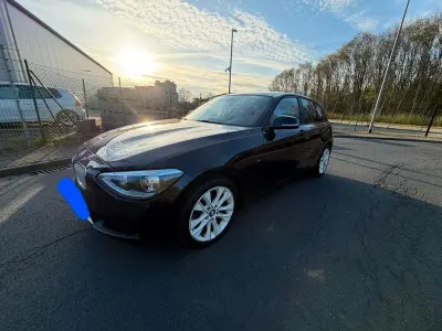 Używany BMW 116 Sport Line 136 KM (100 kW) 2012 Czarny Hatchback