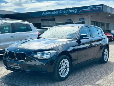 Begagnad BMW 114 Advantage 102 HK (75 kW) 2014 Svart Halvkombi