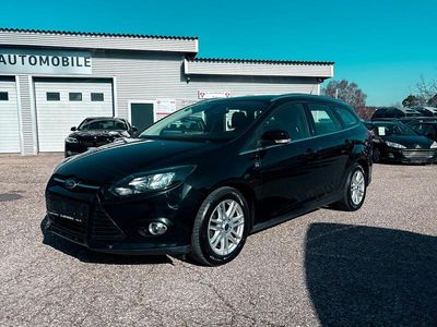 Gebraucht Ford Focus Titanium 116 PS (85 kW) 2012 Pantherschwarz metallic Kombi