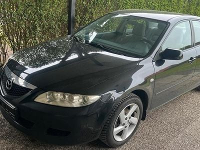 Używany Mazda 6 Comfort 121 KM (88 kW) 2004 Czarny Sedan/Limuzyna