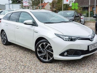 Gebraucht Toyota Auris Hybrid 99 PS (72 kW) 2016 White pearl cs Kombi