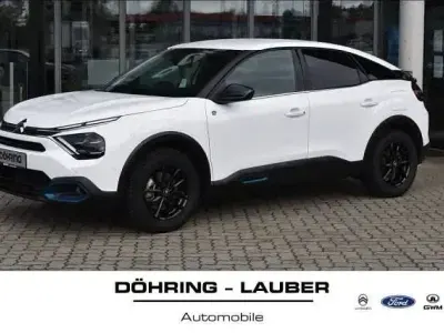 Gebraucht Citroën e-C4 Shine 100 kW (136 PS) 2022 Polarweiss /zweis Limousine