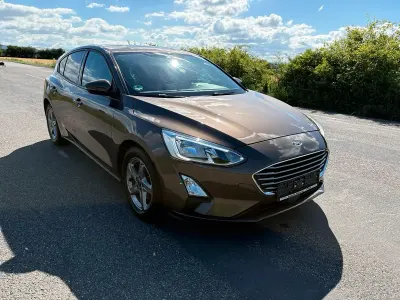 Gebraucht Ford Focus Trend 125 PS (91 kW) 2018 Braun Limousine