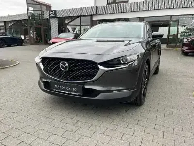 Gebraucht Mazda CX-30 Homura-Line 122 PS (89 kW) 2023 Machine grey (metallic) SUV
