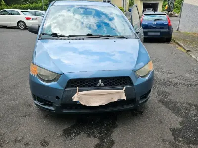 Gebraucht Mitsubishi Colt 75 PS (55 kW) 2009 Blau Kleinwagen