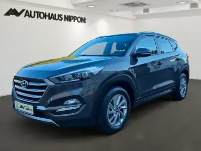 Gebraucht Hyundai Tucson Intro Edition 177 PS (130 kW) 2015 Braun SUV