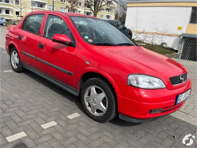 Używany Opel Astra Elegance 82 KM (60 kW) 1999 Czerwony Sedan/Limuzyna