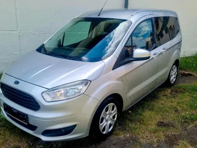 Gebraucht Ford Tourneo Courier 100 PS (73 kW) 2015 Silber Van / Kleinbus