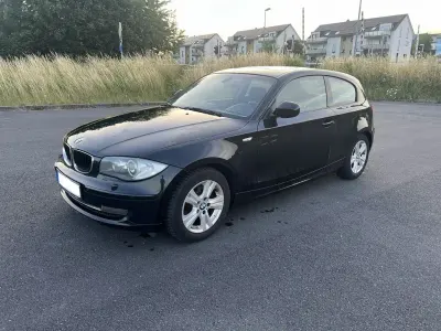 Gebraucht BMW 118 Sport Line 143 PS (105 kW) 2011 Schwarz Kleinwagen