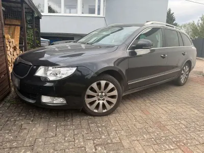 Gebraucht Skoda Superb Ambition 170 PS (125 kW) 2012 Schwarz Kombi
