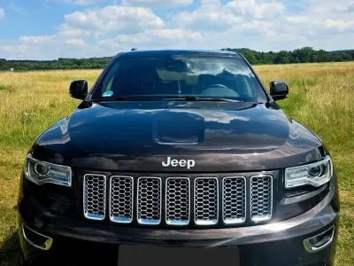 Gebraucht Jeep Grand Cherokee Summit 250 PS (183 kW) 2016 Braun SUV