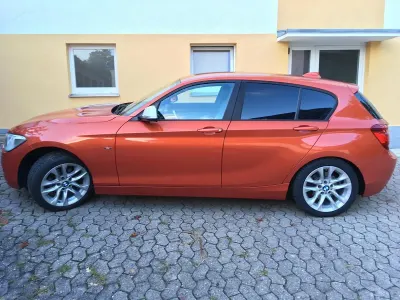 Gebraucht BMW 120 116 PS (85 kW) 2012 Orange Kleinwagen