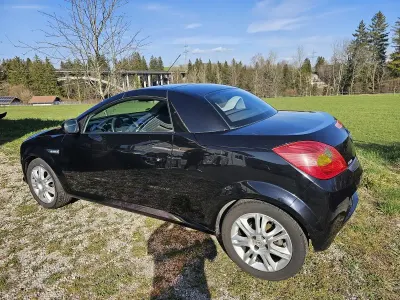 Używany Opel Tigra 125 KM (91 kW) 2008 Czarny Kabriolet