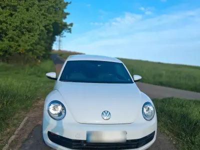 Używany VW Beetle Exclusive 105 KM (77 kW) 2014 Biały Hatchback