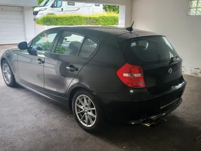 Gebraucht BMW 118 143 PS (105 kW) 2010 Schwarz Kleinwagen