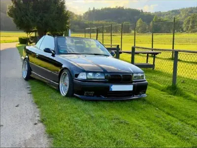 Gebraucht BMW 318 Cabriolet 115 PS (84 kW) 1997 Schwarz Cabrio