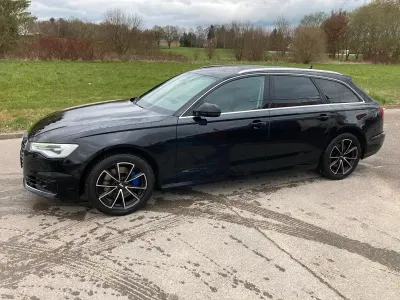 Używany Audi A6 218 KM (160 kW) 2015 Czarny Kombi