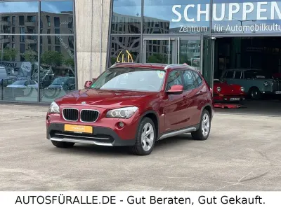 Gebraucht BMW X1 Sport Line 177 PS (130 kW) 2011 Vermilionrot metallic SUV