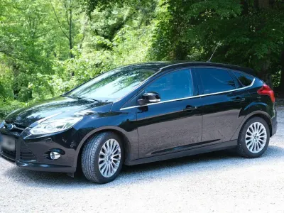 Usado Ford Focus Titanium 125 CV (91 kW) 2014 Negro Berlina