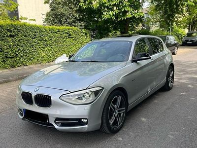 Begagnad BMW 118 Sport Line 170 HK (125 kW) 2012 Grå Halvkombi