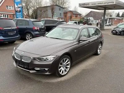 Gebraucht BMW 330 Sport Line 258 PS (189 kW) 2013 Havanna metallic Kombi
