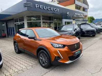 Gebraucht Peugeot e-2008 Active 100 kW (136 PS) 2022 Orange SUV