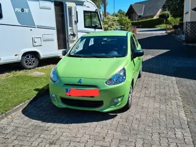 Gebraucht Mitsubishi Space Star 71 PS (52 kW) 2014 Grün Van / Kleinbus