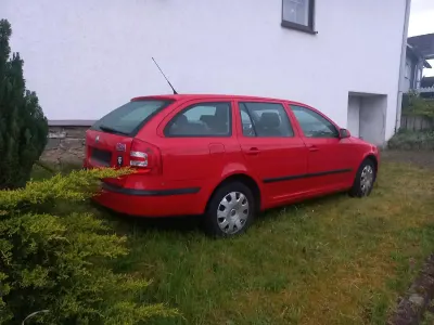 Używany Skoda Octavia 102 KM (75 kW) 2006 Czerwony Kombi