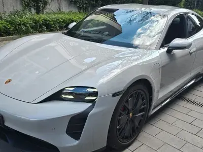 Occasion Porsche Taycan 439 kW (598 PK) 2023 Grijs Sedan