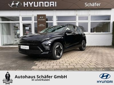 gebraucht Hyundai Kona Elektro (SX2) 65,4kWh PRIME Sitz-Kom-P-Leder GSD Assist-P2 HUD Navi Leder digitales Cockpit