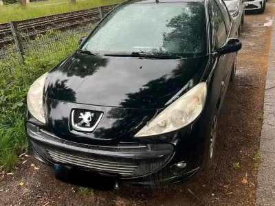 Gebraucht Peugeot 206+ 65 PS (47 kW) 2010 Schwarz Kleinwagen
