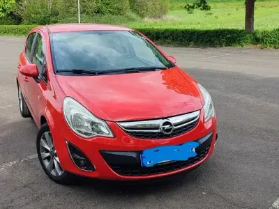 Używany Opel Corsa Innovation 87 KM (63 kW) 2012 Czerwony Hatchback