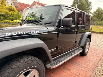 Gebraucht Jeep Wrangler Unlimited Rubicon 200 PS (147 kW) 2012 Schwarz SUV