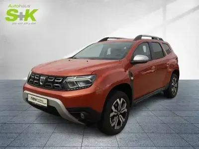 Używany Dacia Duster Prestige 101 KM (74 kW) 2022 Pomarańczowy SUV