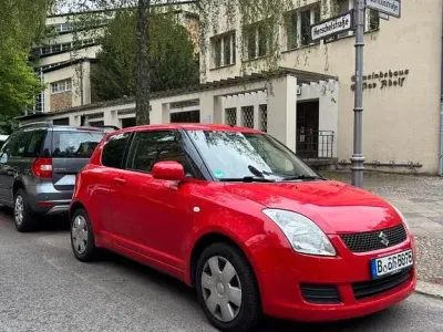 Używany Suzuki Swift Club 92 KM (67 kW) 2005 Czerwony Hatchback